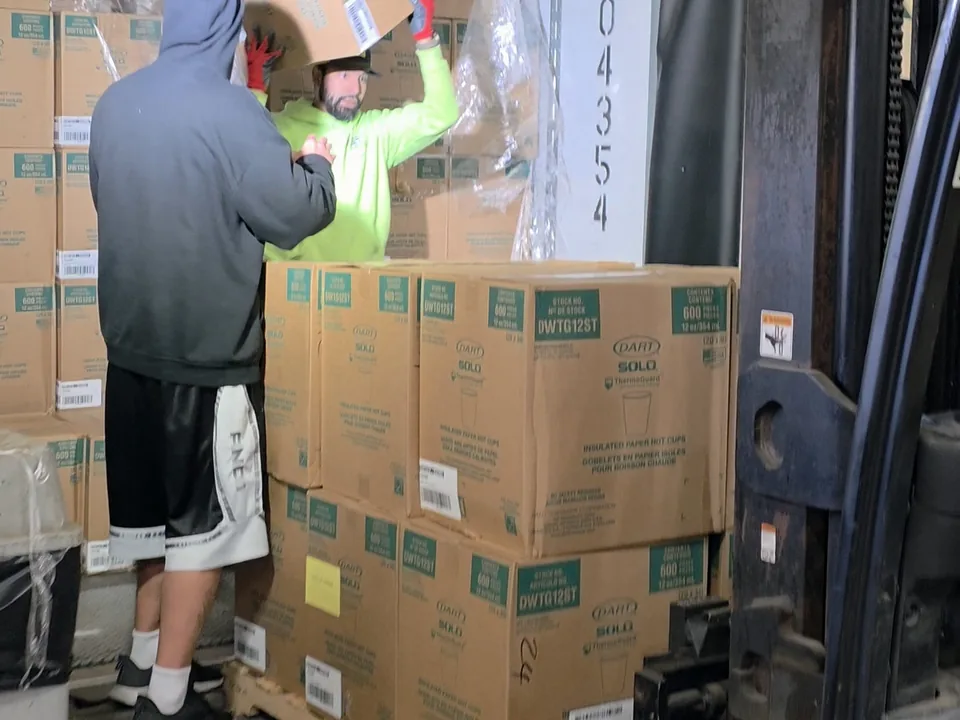 CLS crew unloading cartons from a trailer in Florence South Carolina